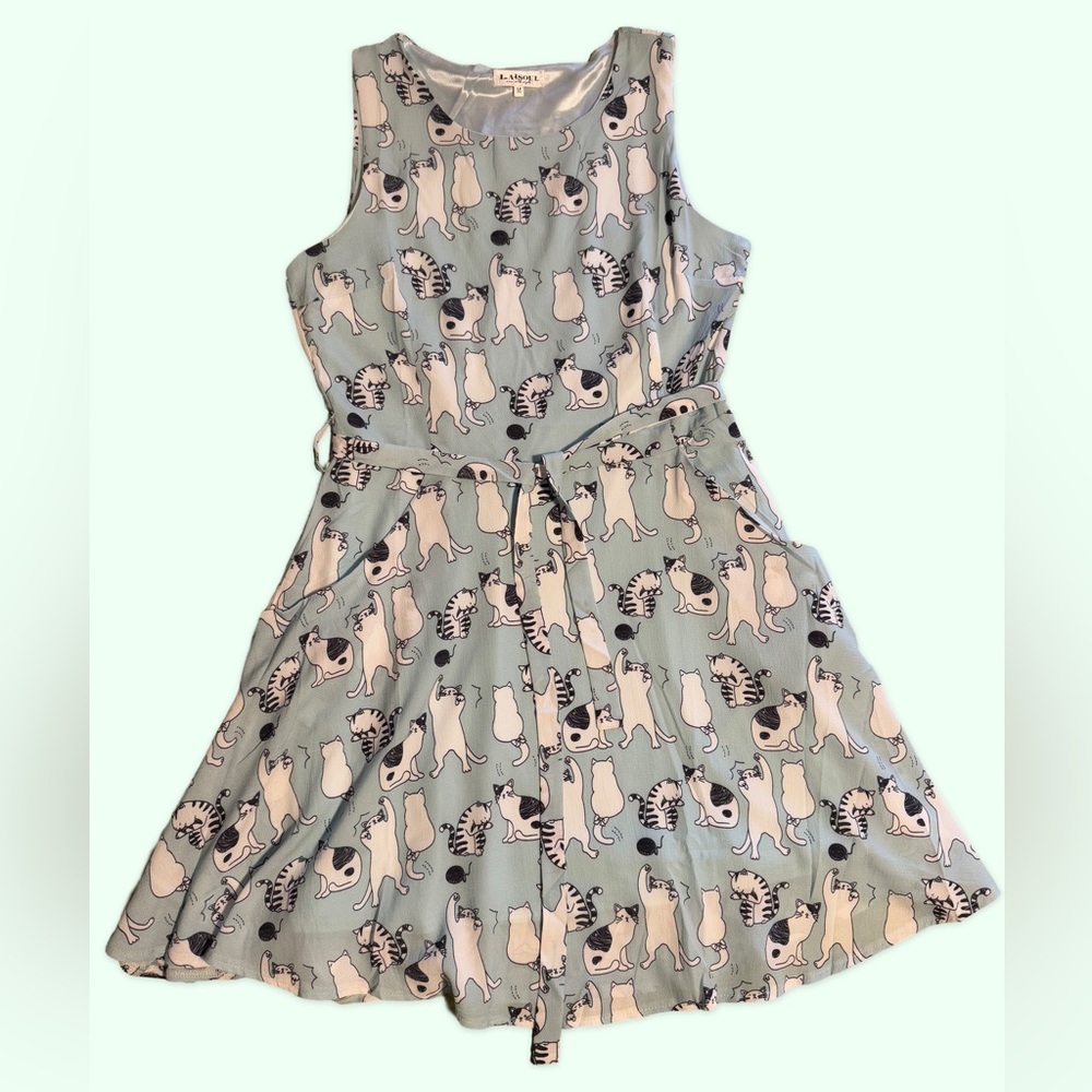 CATS ! COMFORT! STYLE!This is the cutest cat dress! Classy, cute, and POCKETS!